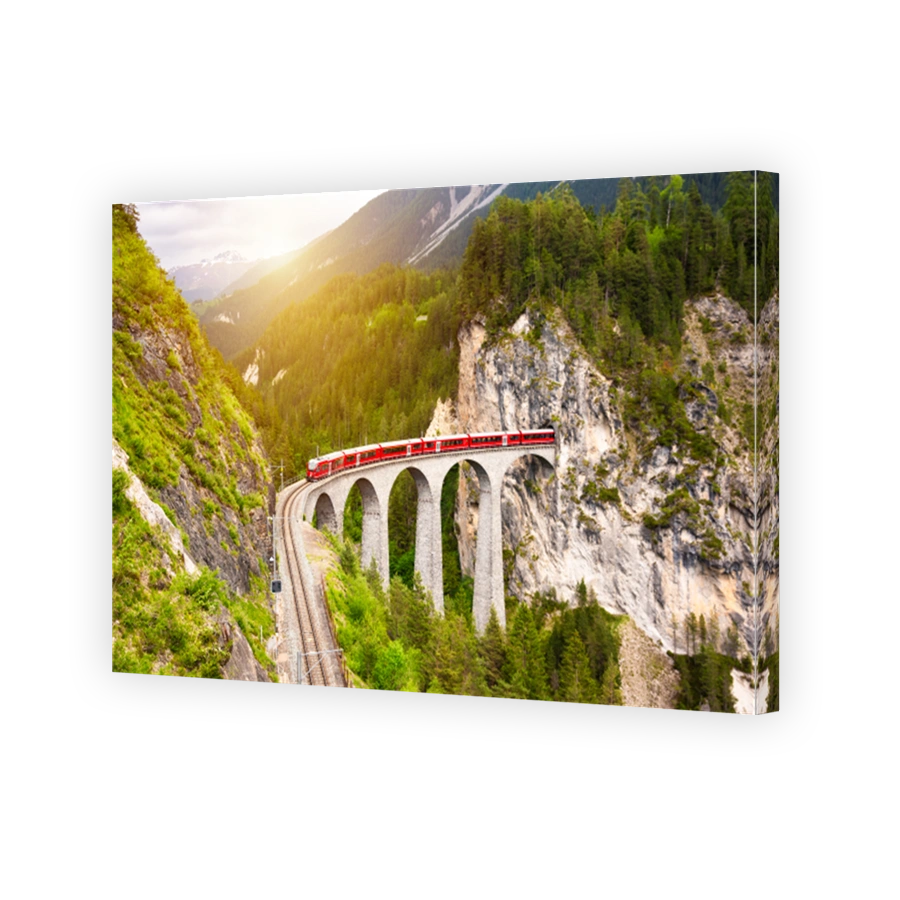Swiss red train on viaduct in mountain, scenic ride