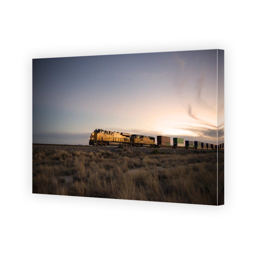 Railroad locomotive at dusk