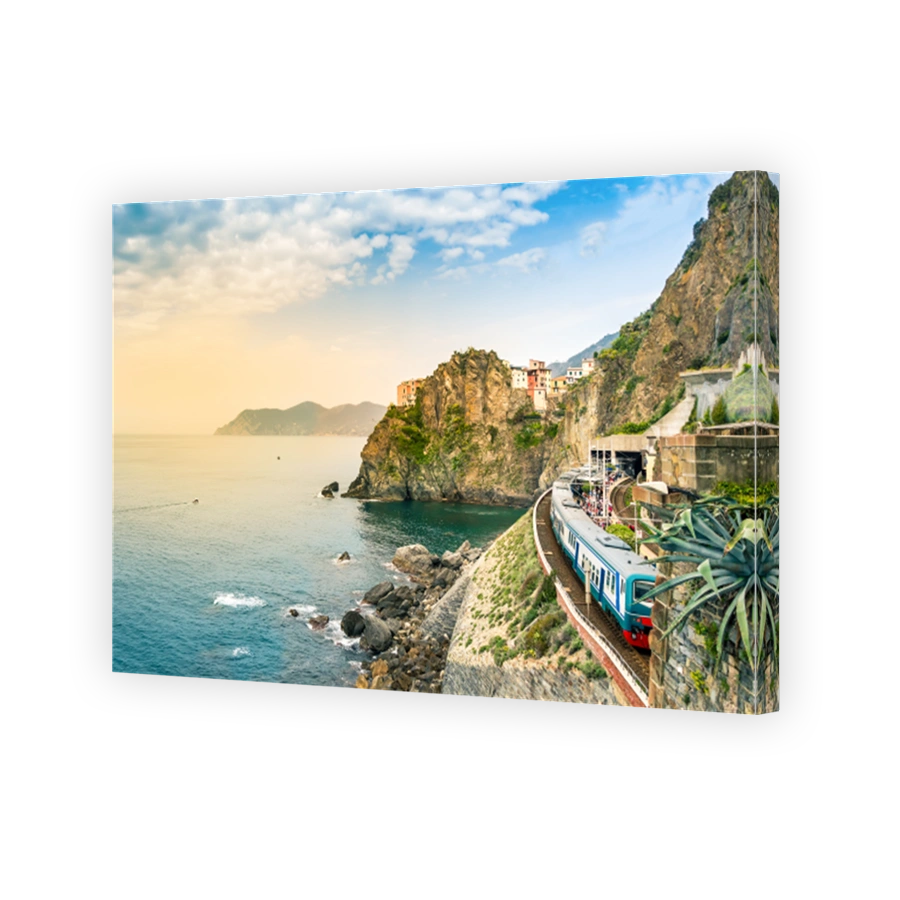 Manarola, Cinque Terre - train station in famous village with colorful houses on cliff over sea in Cinque Terre