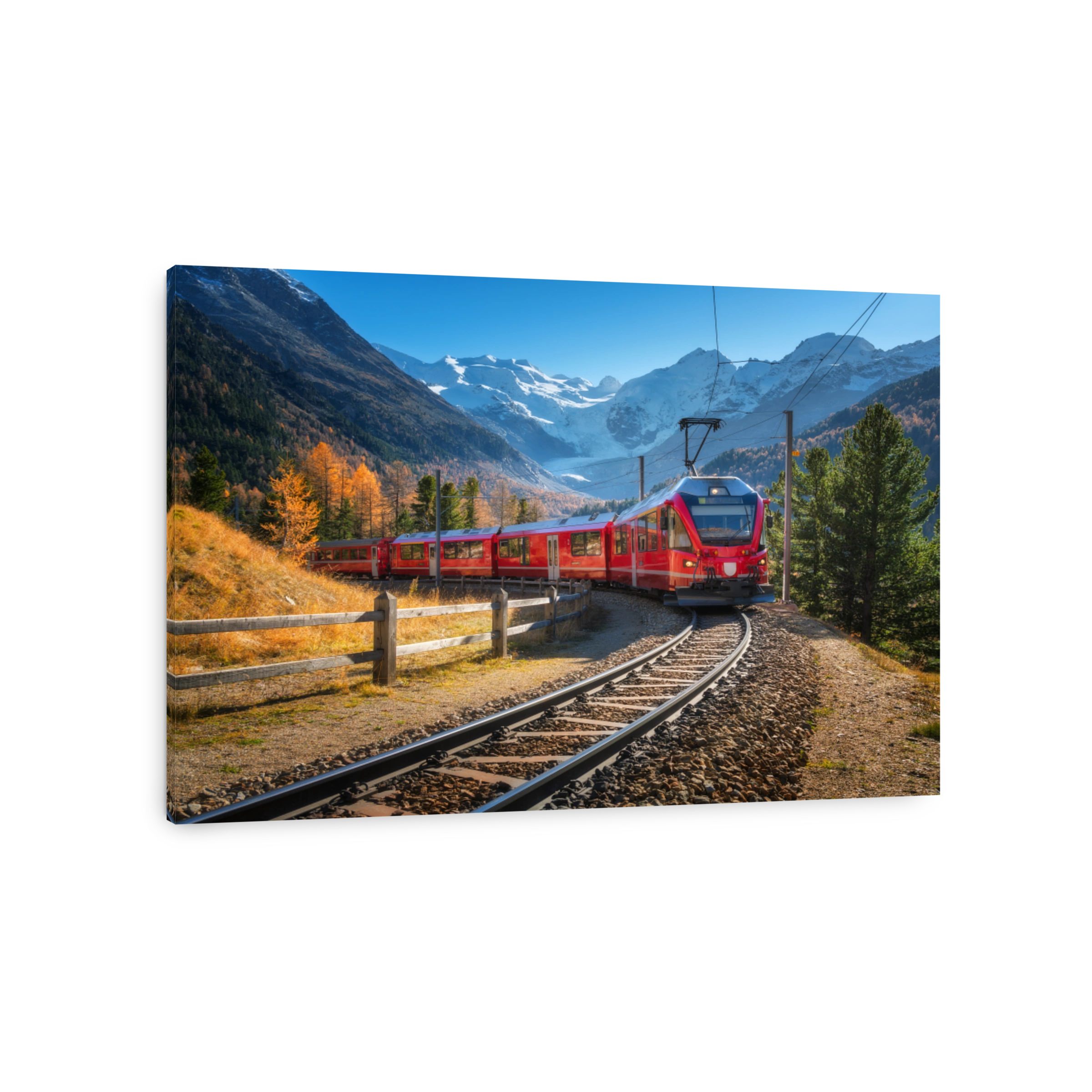 Red modern electric train traveling along a railway, winding through a stunning high mountains with snow-capped peaks and vibrant autumn trees in switzerland. Bernina Express in fall. Railway tourism