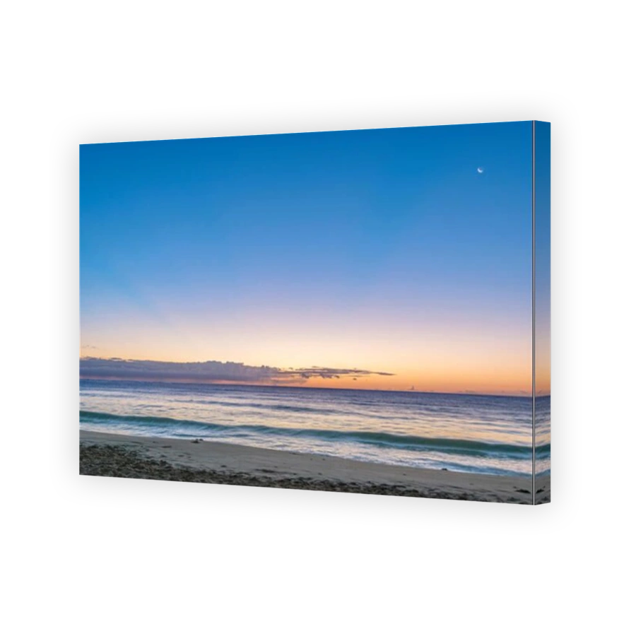 Sunrise over beach and ocean