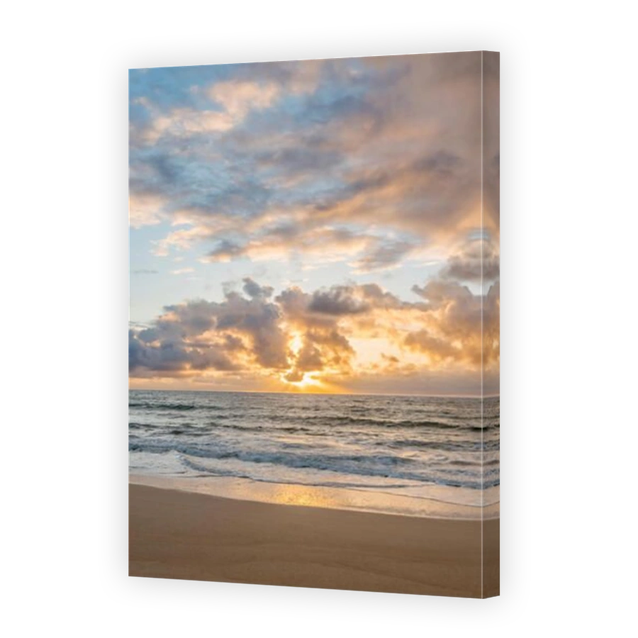 Sunrise over ocean on beach