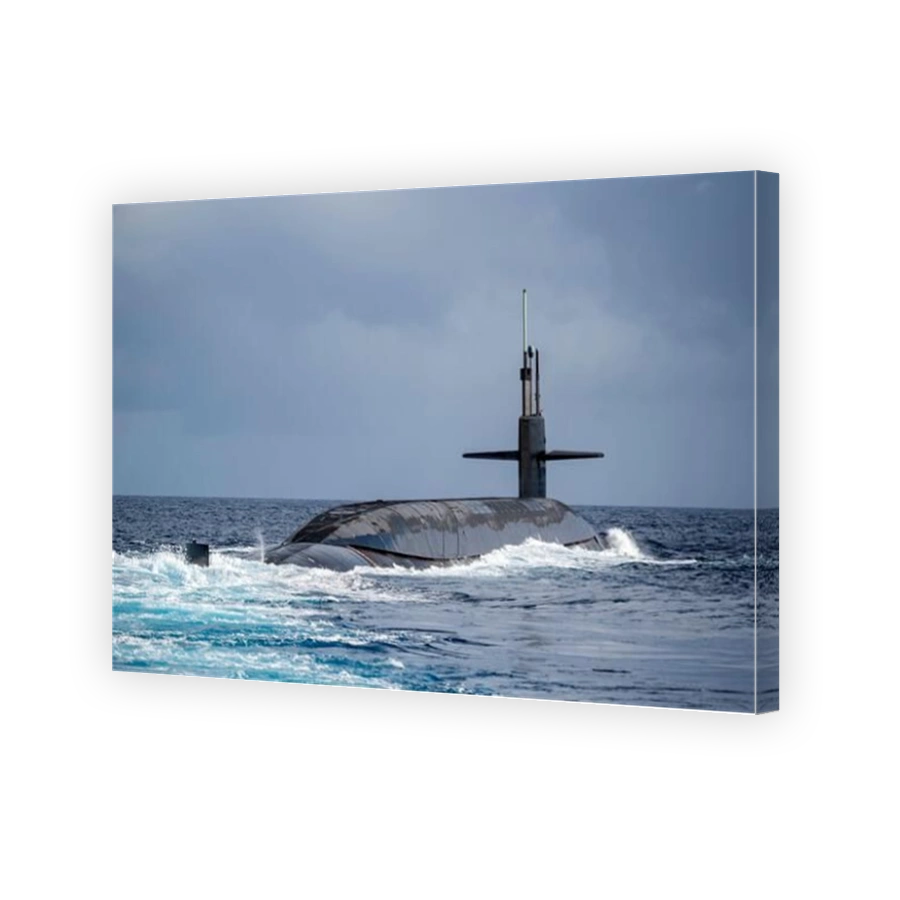 Ballistic-missile submarine USS Henry M. Jackson surfaces in the Atlantic Ocean.