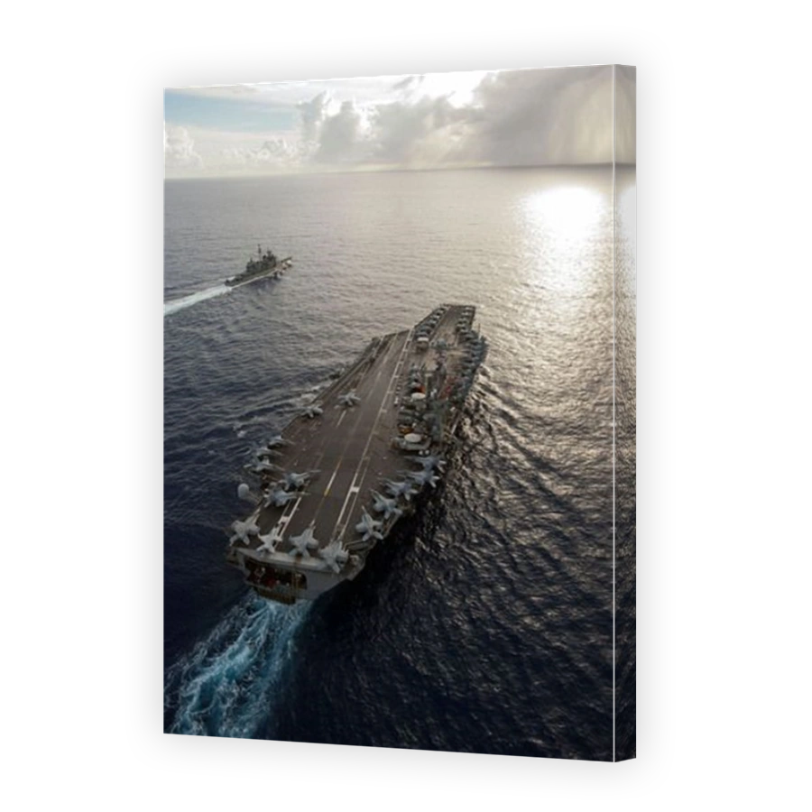 USS George Washington and USS Mobile Bay underway in the Pacific Ocean.