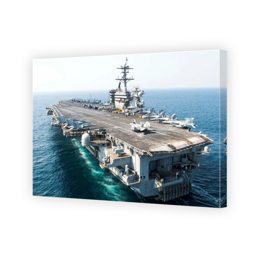 The aircraft carrier USS Theodore Roosevelt transits the Arabian Gulf.