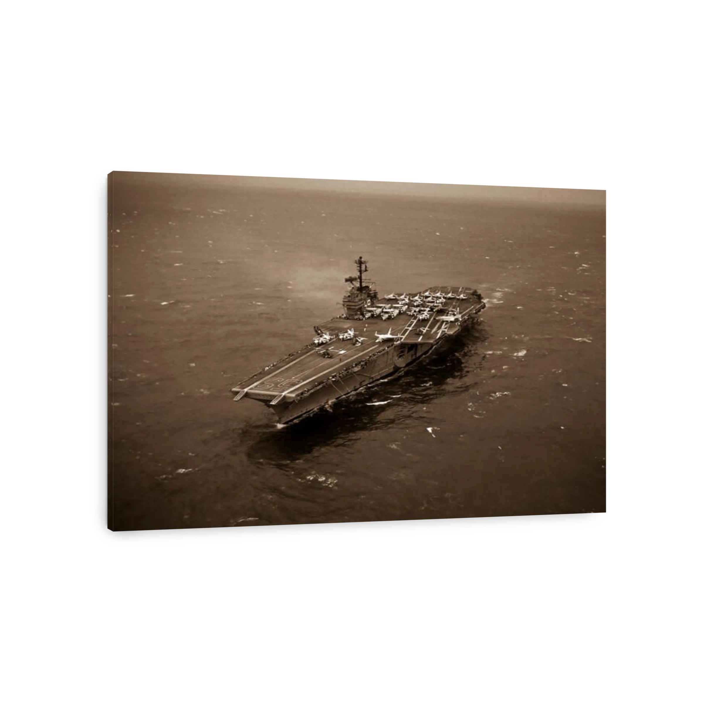 An aerial port bow view of the Forrestal Class Aircraft Carrier, USS FORRESTAL (CVA 59)
