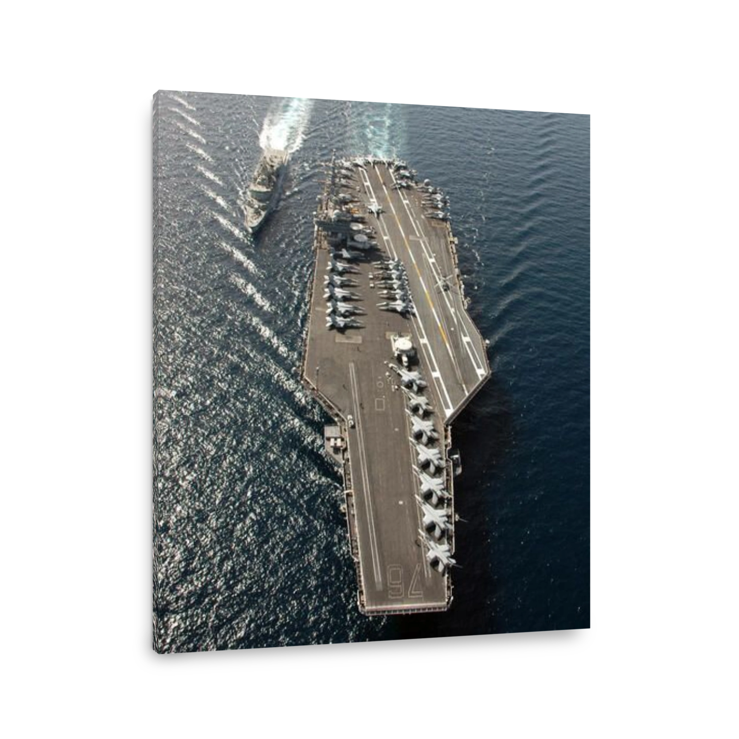 The Royal Australian Navy frigate HMAS Ballarat comes along side the Nimitz-class aircraft carrier USS Ronald Reagan (CVN 76), in preparation for a fueling at sea evolution. U.S. Navy photo by Photographer's Mate 3rd Class Aaron Burden