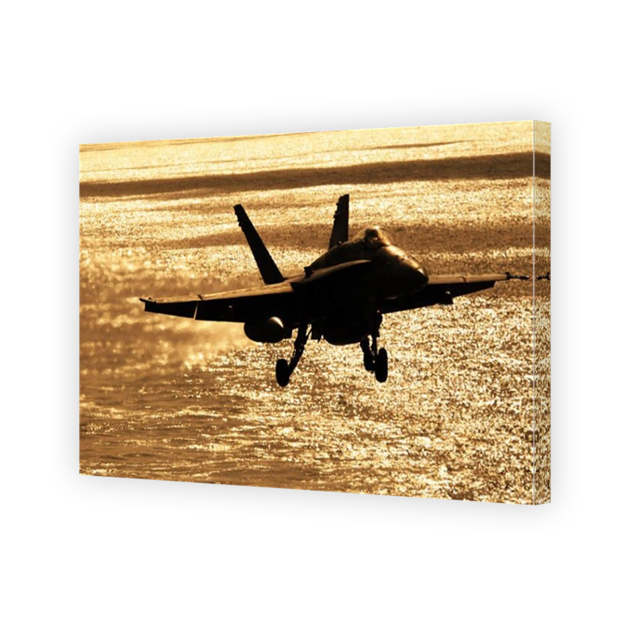 An F/A 18C Hornet prepares to land on the flight deck of the Nimitz-class aircraft carrier USS John C. Stennis (CVN 74).  U.S. Navy photo by Mass Communication Specialist Seaman Adam Henderson