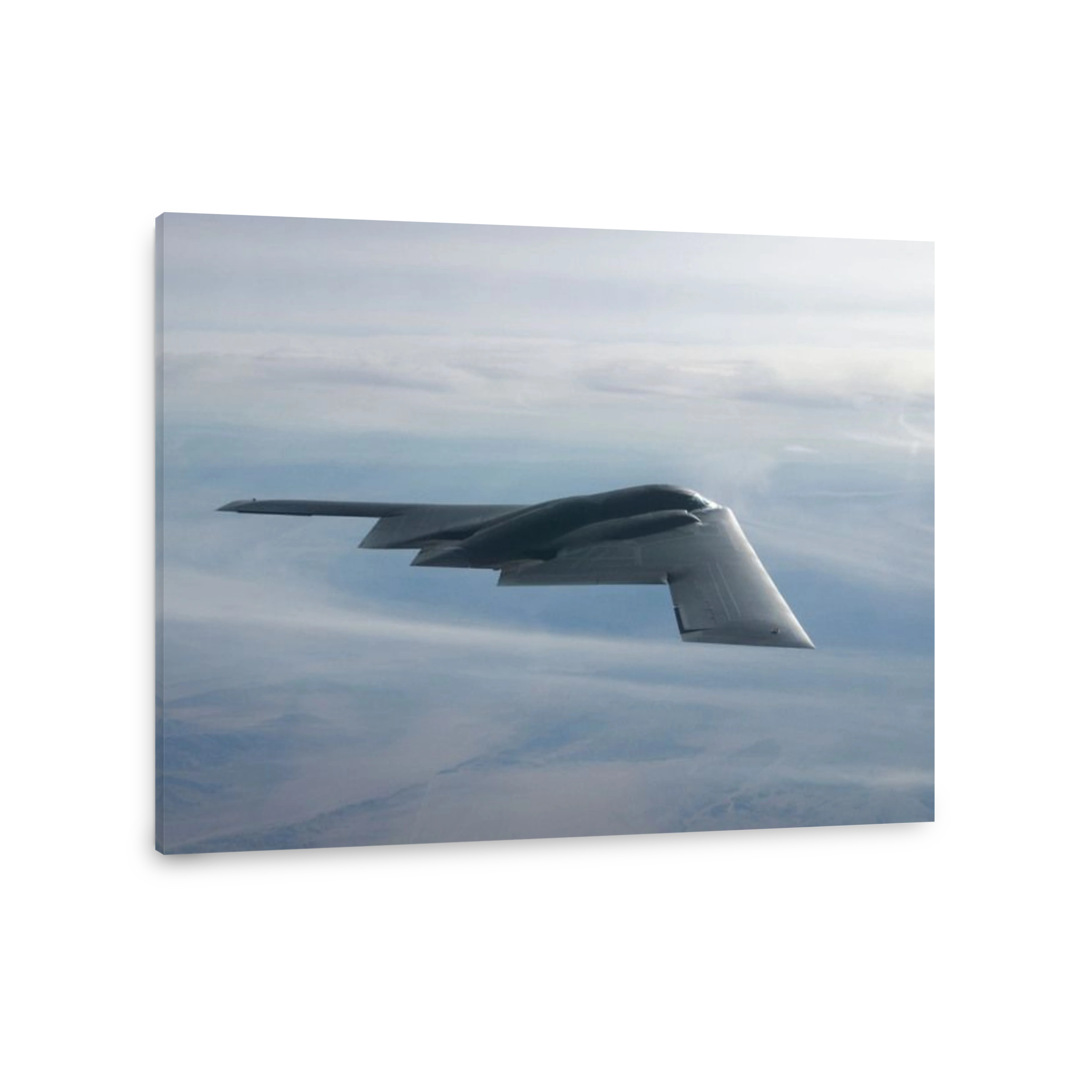 August 14, 2003 - A B-2 Spirit soars through the sky.
