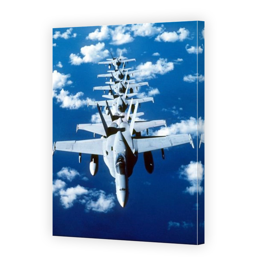F/A-18C Hornet aircraft fly in formation during Operation Desert Shield.