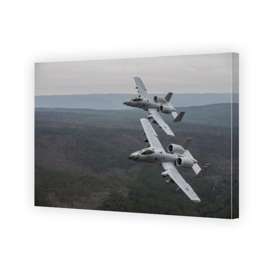 December 30, 2013 - A-10 Thunderbolt II's conduct a training mission over Razorback Range, Fort Chaffee Maneuver Training Center