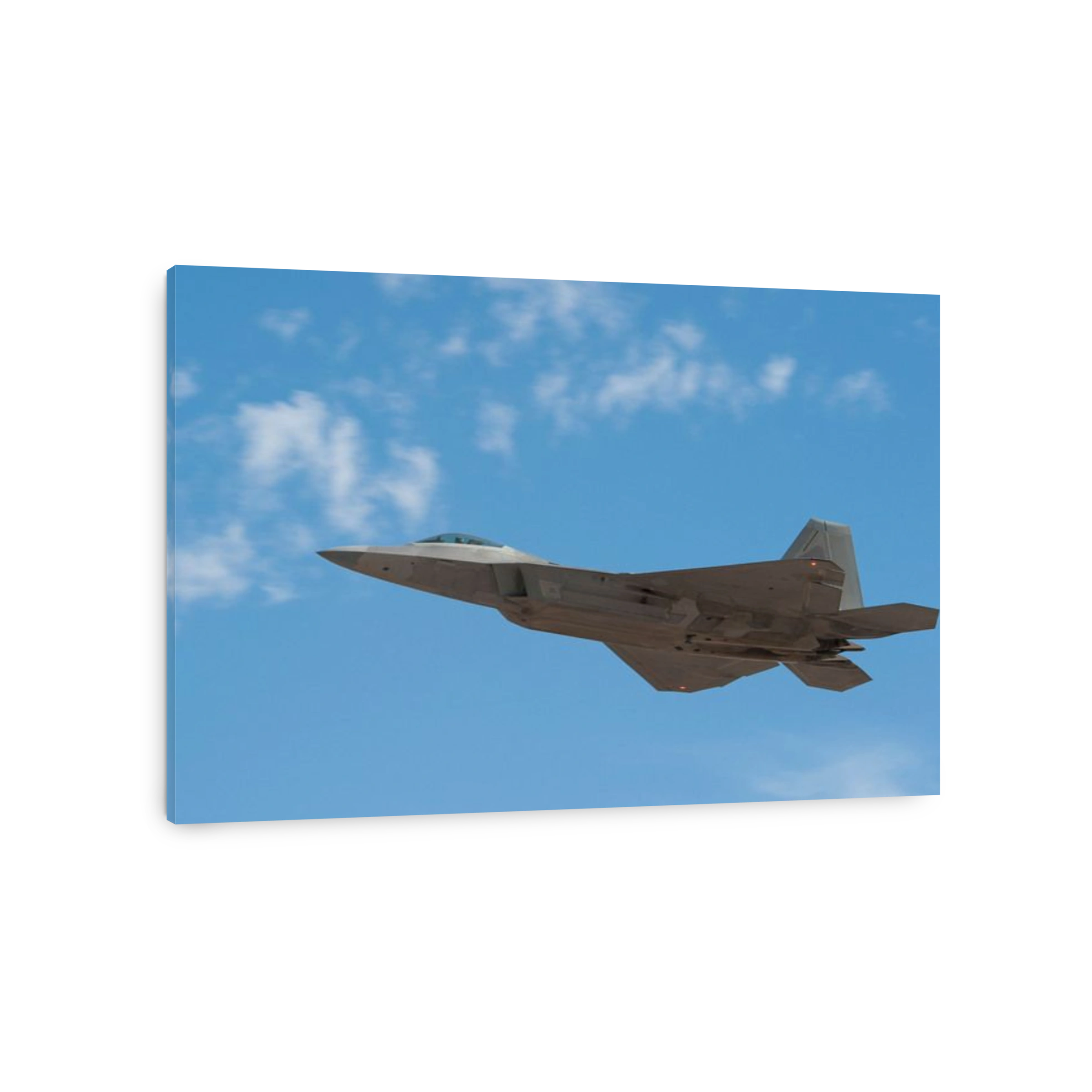 September 21, 2011 - An F-22 Raptor takes flight on a training sortie from Holloman Air Force Base, New Mexico.