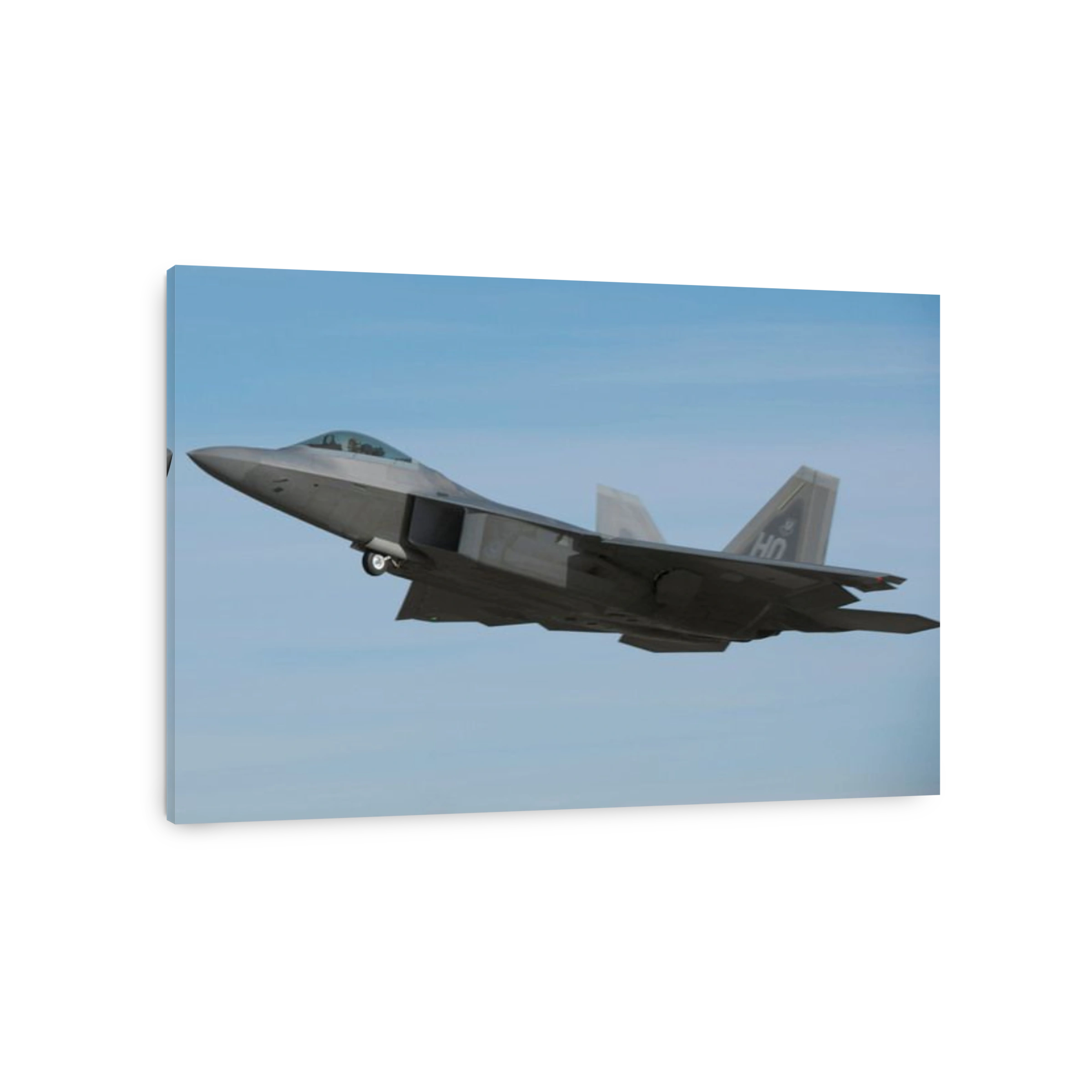 February 16, 2012 - An F-22 Raptor in flight during a training mission over Holloman Air Force Base, New Mexico.