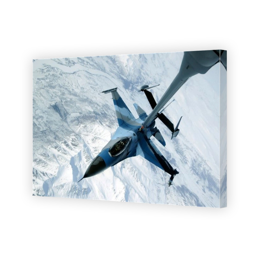An F-16 Aggressor sits in contact position while a KC-10 Extender off-loads fuel.