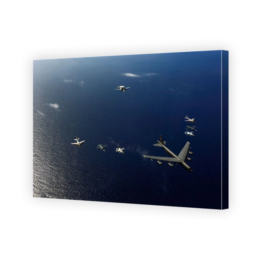 A U.S. Air Force B-52 Stratofortress aircraft leads a formation of aircraft.
