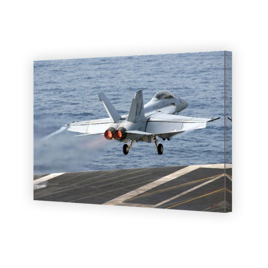 Arabian Sea, July 6, 2009 - An F/A-18F Super Hornet launches from the aircraft carrier USS Ronald Reagan (CVN-76).