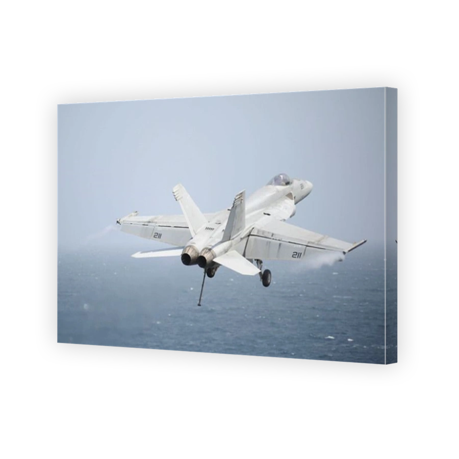 August 22, 2013 - An F/A-18E Super Hornet in flight over the Gulf of Oman.