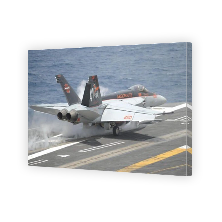 Pacific Ocean, May 5, 2014 - An F/A-18E Super Hornet launches from the aircraft carrier USS Nimitz (CVN 68).