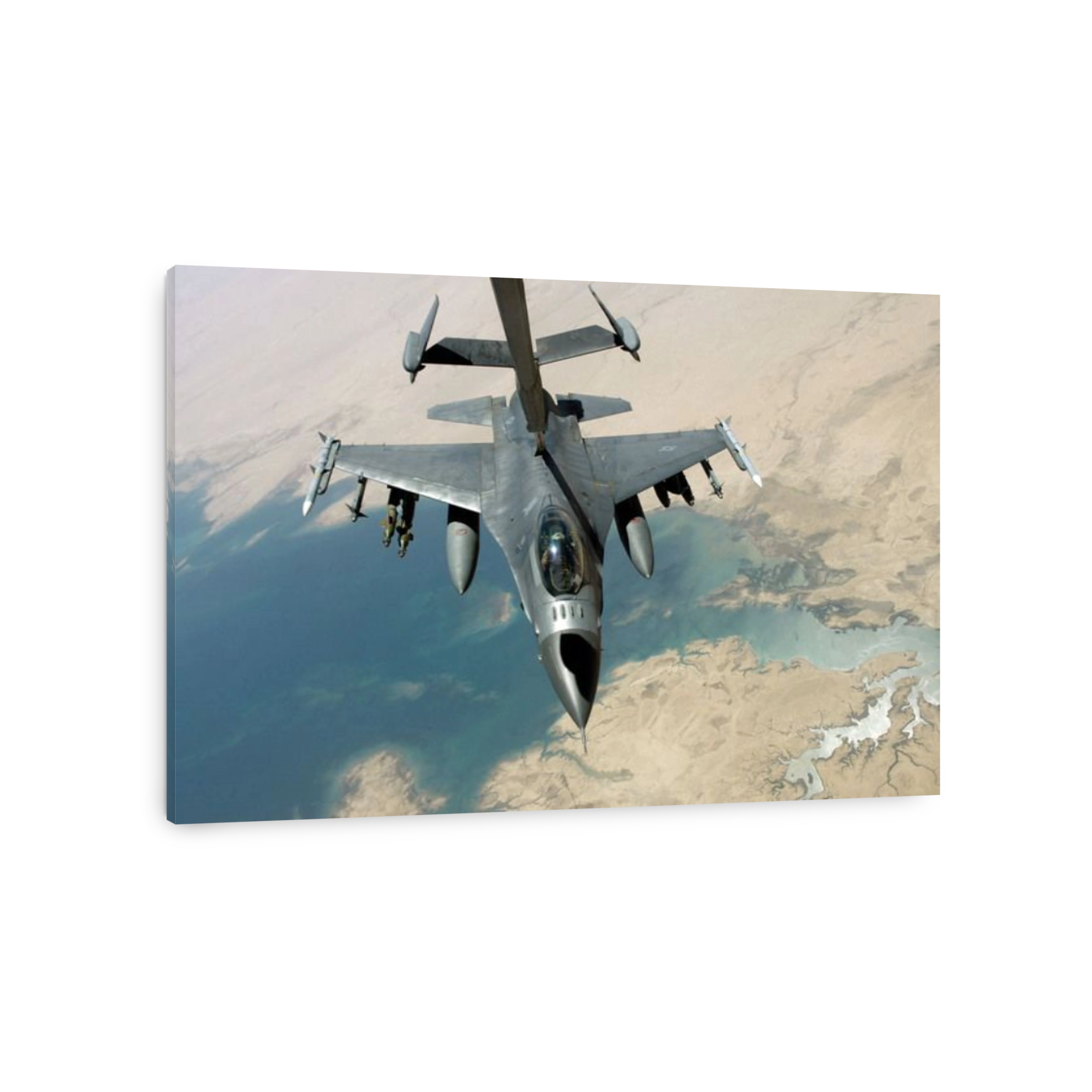 An F-16 Fighting Falcon refuels from a KC-10 Extender while flying a close air-support mission over Iraq July 18, 2006.