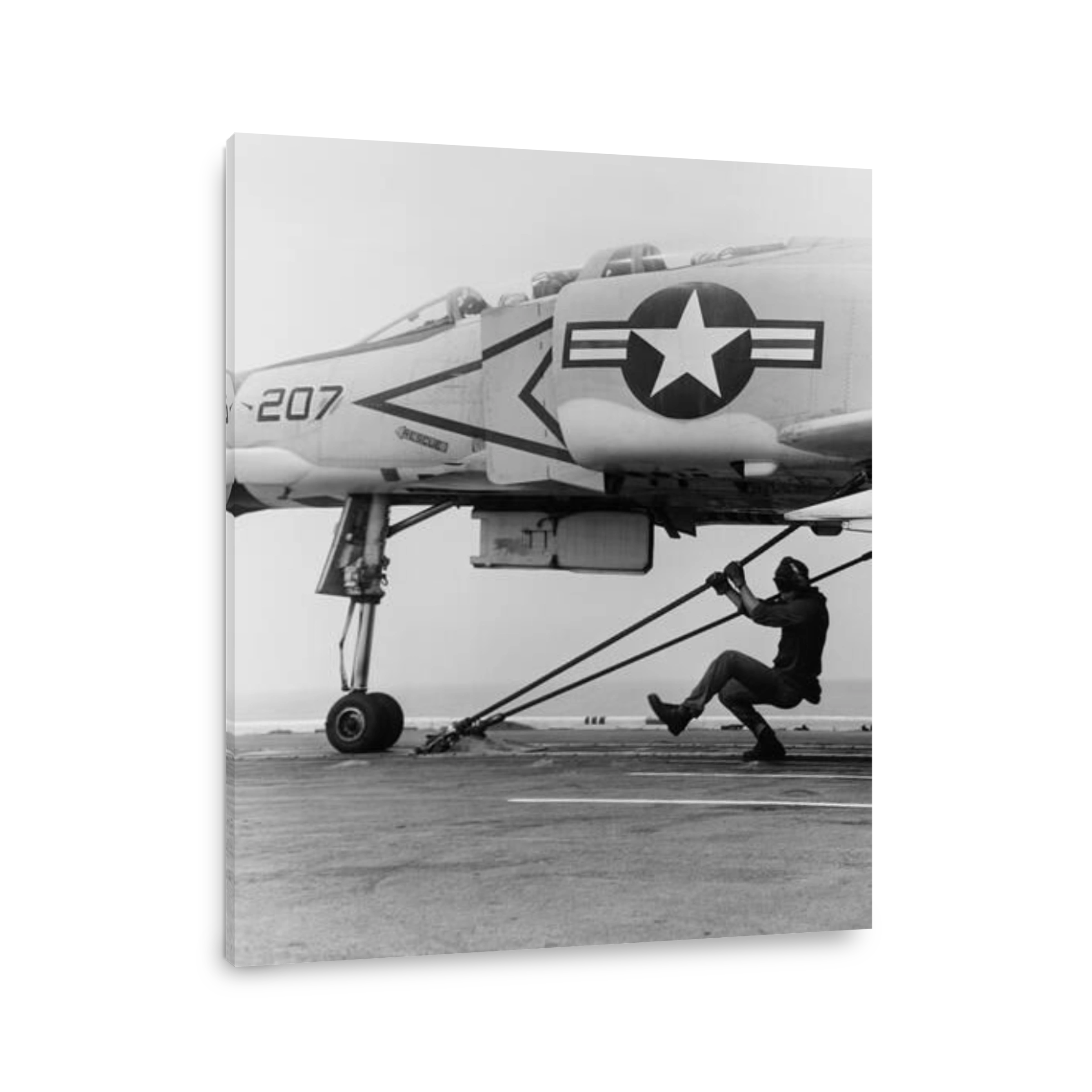 An F-4B Phantom II fighter plane is readied for launch from USS Coral Sea, 1969.