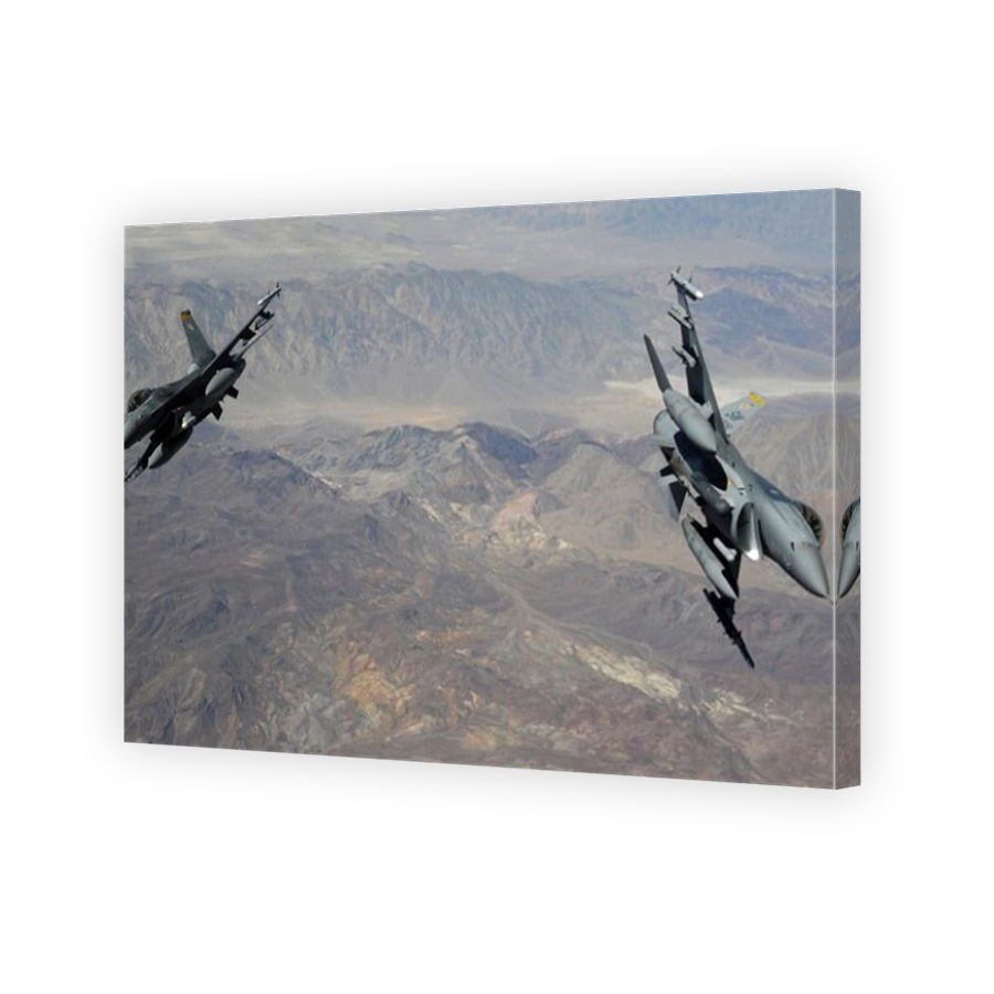 April 27, 2011 - Two F-16 Fighting Falcons break out of formation during Green Flag West at Nellis Air Force Base, Nevada.
