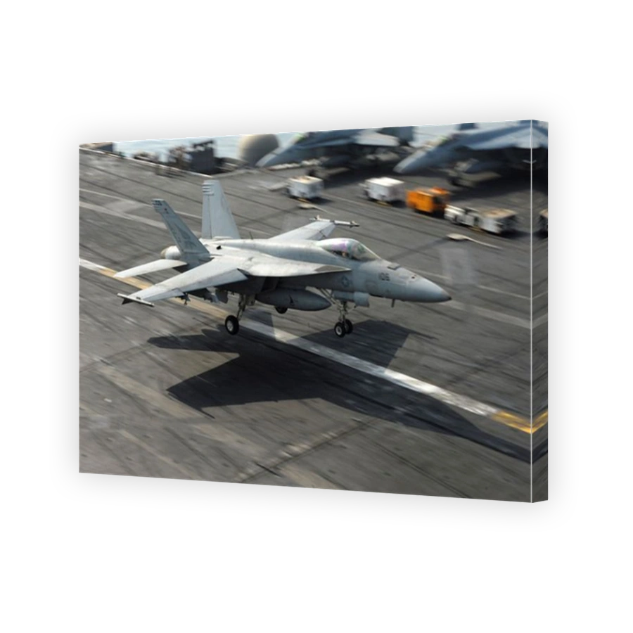 October 22, 2012 - An F/A-18E Super Hornet lands aboard the Nimitz-class aircraft carrier USS Dwight D. Eisenhower.