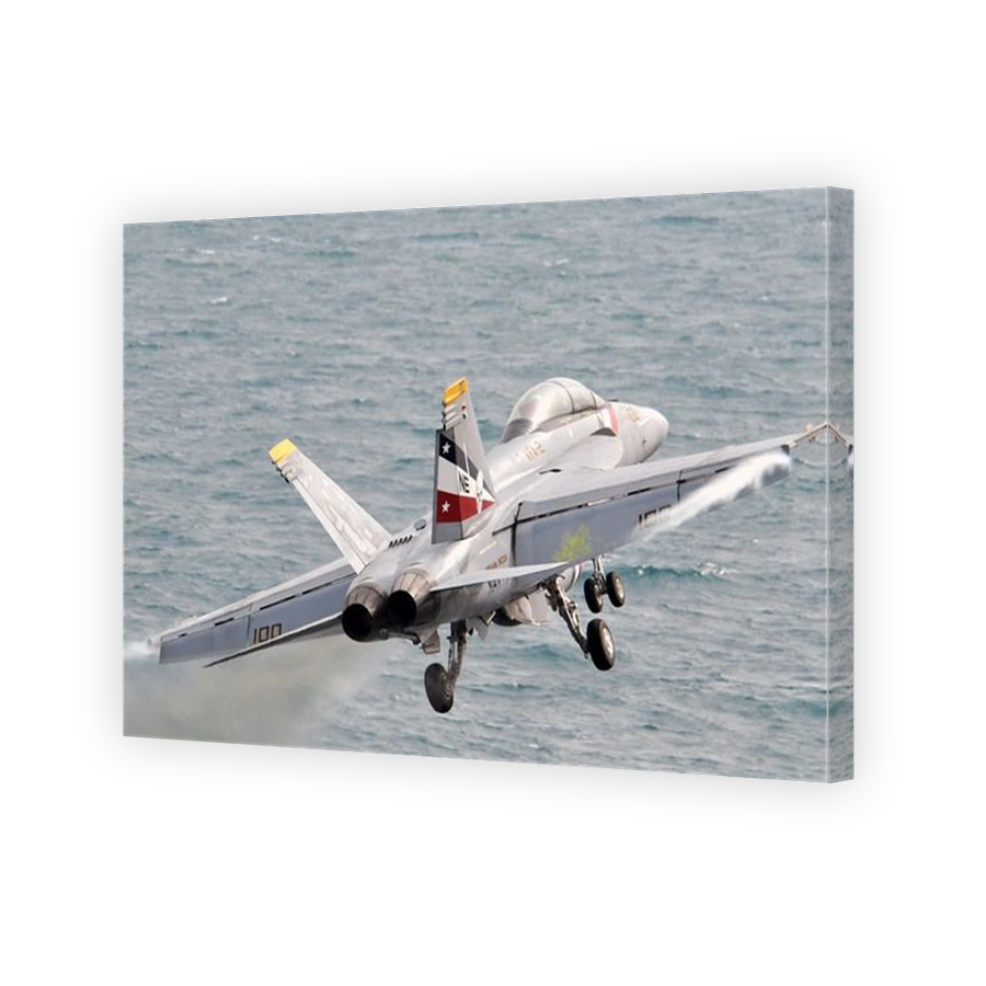 Arabian Gulf, February 9, 2012 - An F/A-18F Super Hornet launches from the Nimitz-class aircraft carrier USS Abraham Lincoln.