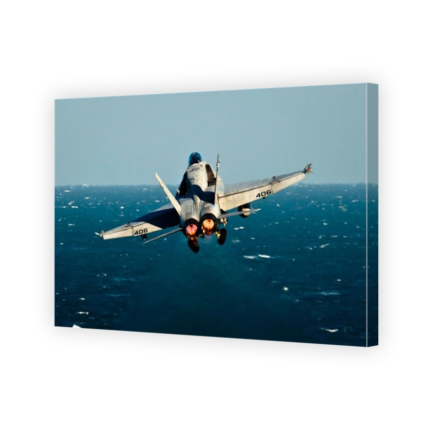 Arabian Gulf, December 3, 2011 - An F/A-18C Hornet launches from the Nimitz-class aircraft carrier USS John C. Stennis.