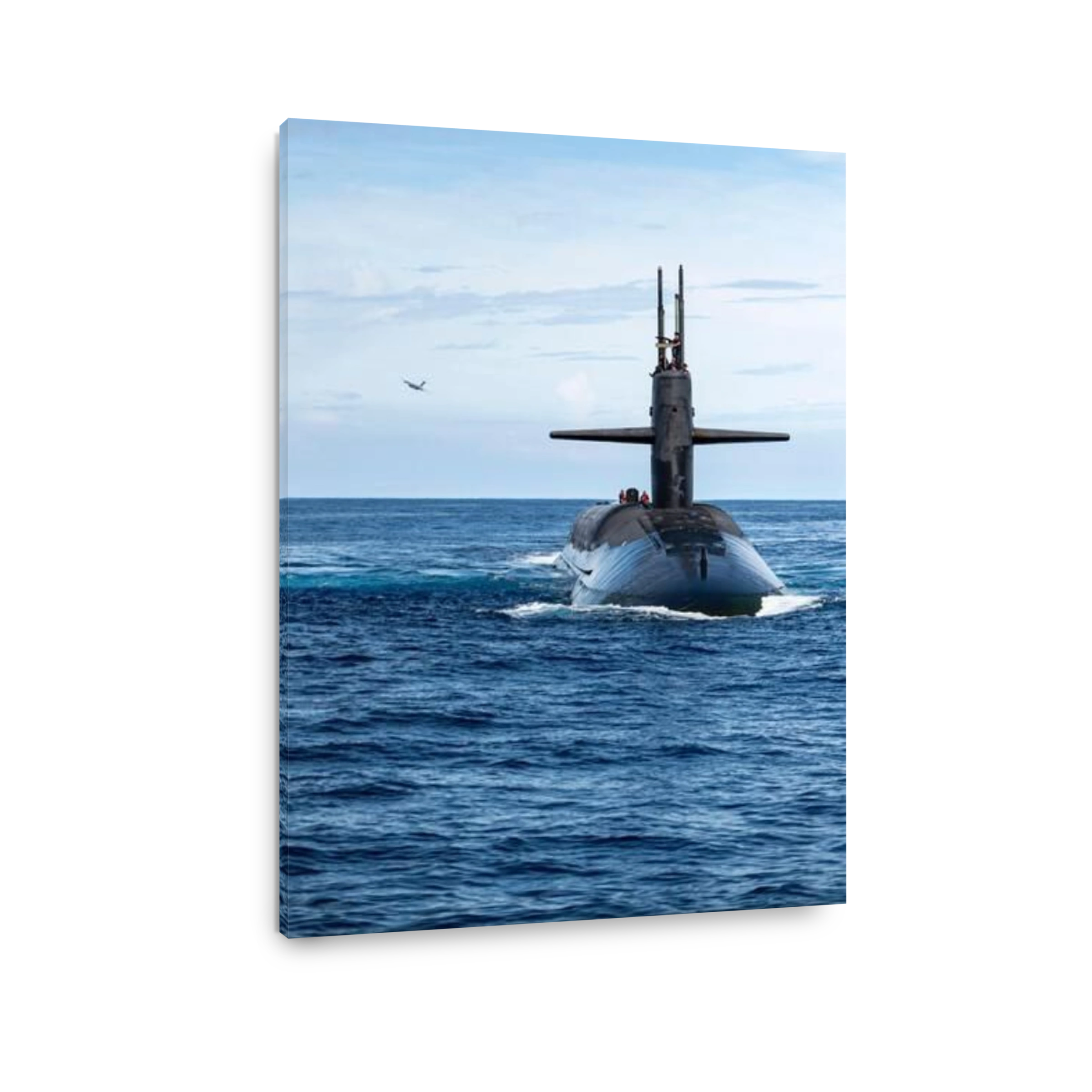 A U.S. Air Force C-17 Globemaster III delivers a payload to USS Henry M. Jackson.