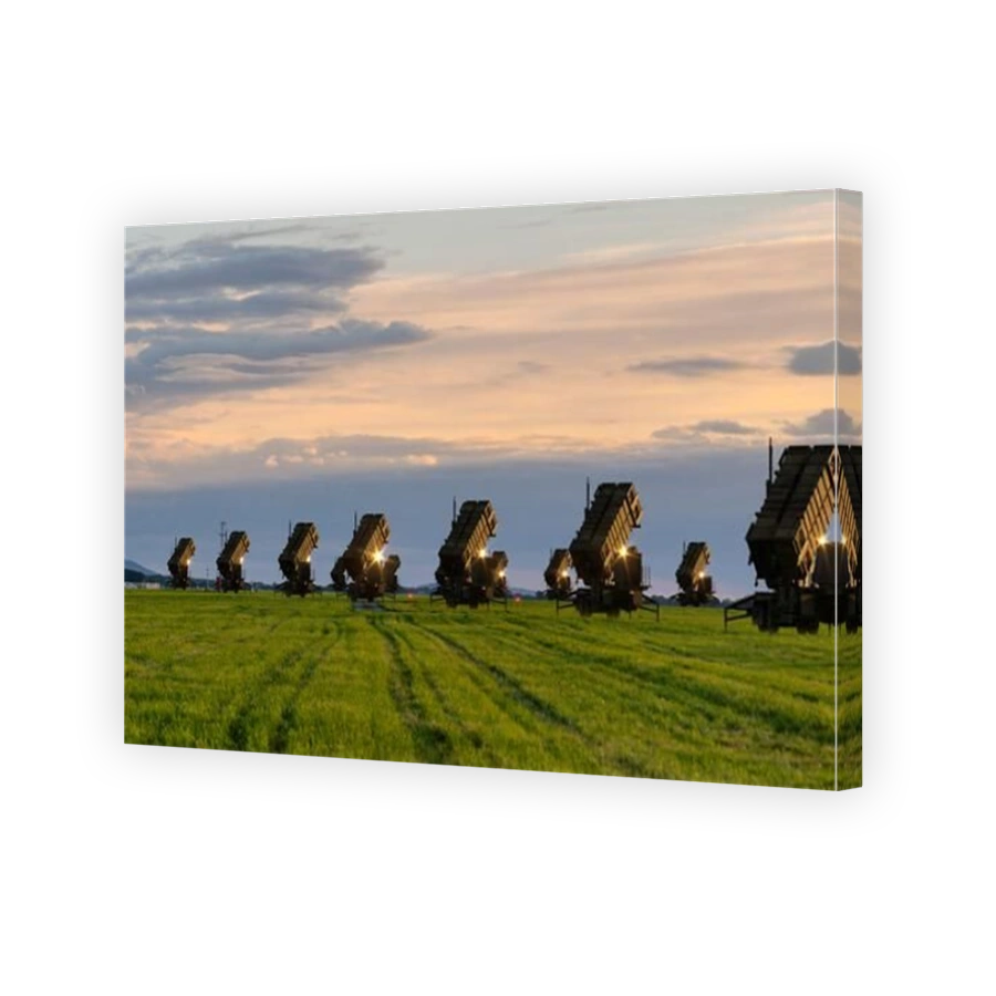 Surface-to-air missile systems deployed on a grassy field