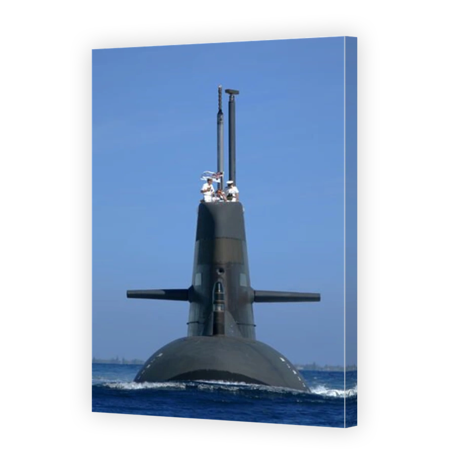 HMAS Rankin, an Australian Collins Class, diesel electric submarine, heads out to the open sea at the start of a mission.