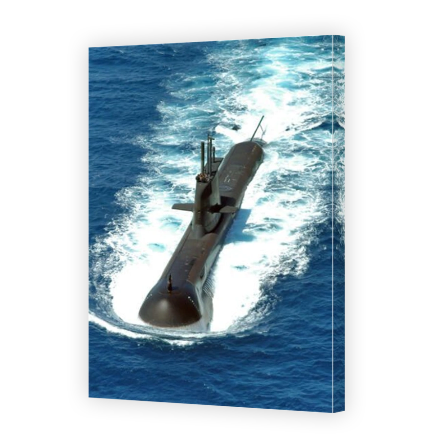 An aerial view of an Australian Navy Collins Class submarine, HMAS Rankin as it leaves for the open sea on a 6 month deployment