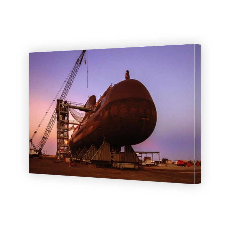 An Australian Navy Collins Class submarine at dawn, undergoing periodic maintenance on the hard stand in Western Australia.