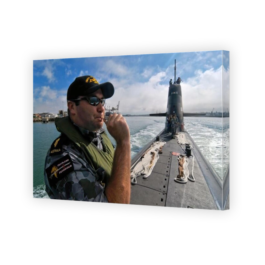 Naval crewman piping an Australian Navy Collins Class diesel electric submarine leaving harbour.