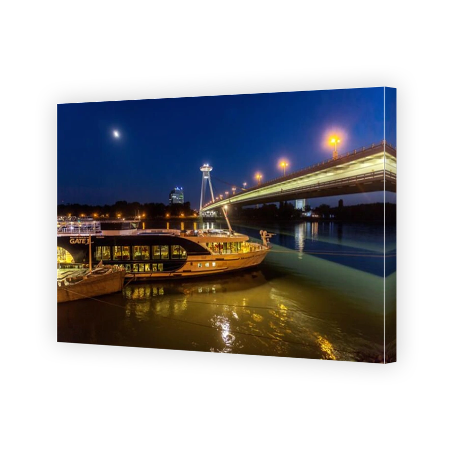 Boats under Bridge of the Slovak National Uprising (SNP) with UFO restaurant, Danube, Bratislava, Slovakia, Europe Danube ship lights European river
