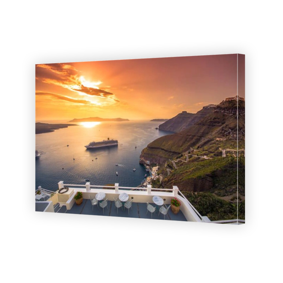 Amazing evening view of Fira, caldera, volcano of Santorini, Greece with cruise ships at sunset. Cloudy dramatic sky.